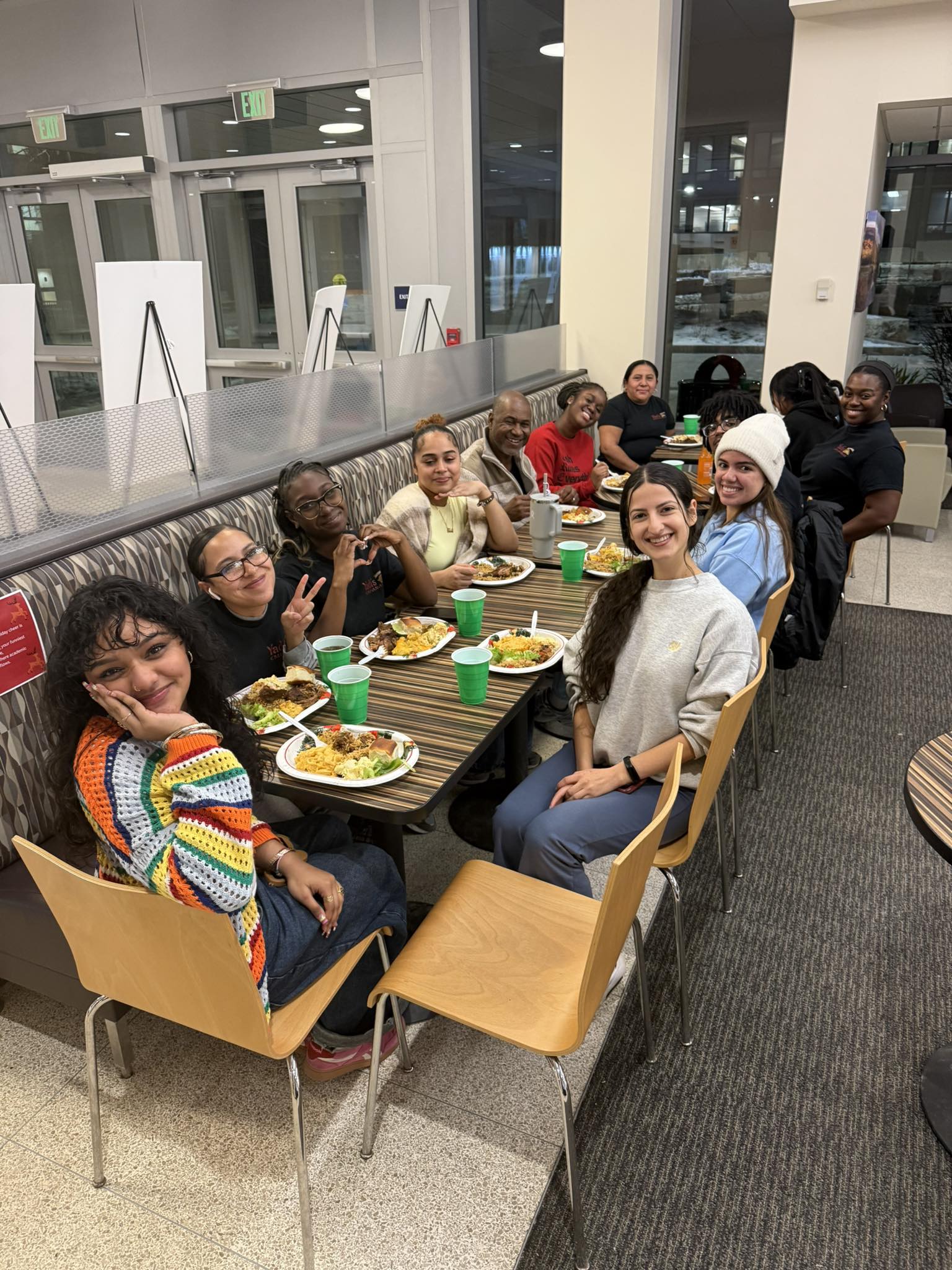 Team with customer enjoying the food